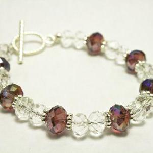 Purple And Clear Iridescent Fire Polished Glass..